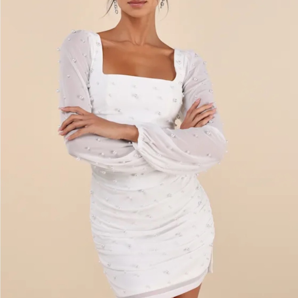 Elegant White Dress with Sheer Sleeves